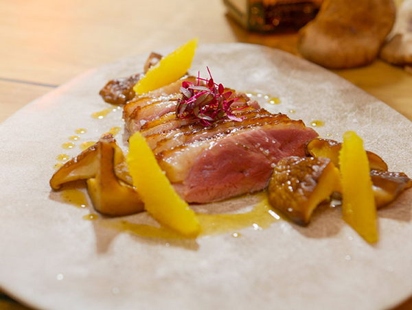 Duck breast flambéed with Cointreau®, orange sauce