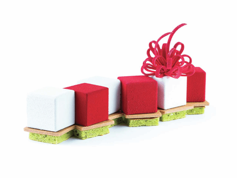 Pistachio, passion fruit, and strawberry Christmas log recipe