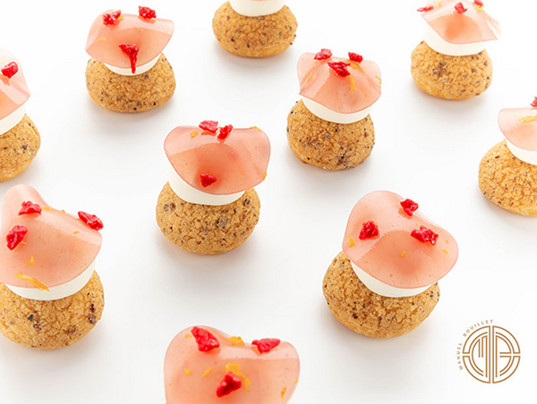 Choux pastry recipe with Cointreau strawberry cream, covered with grapefruit ganache